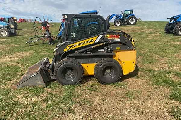 New Holland L218: Компактный погрузчик, который меняет правила игры